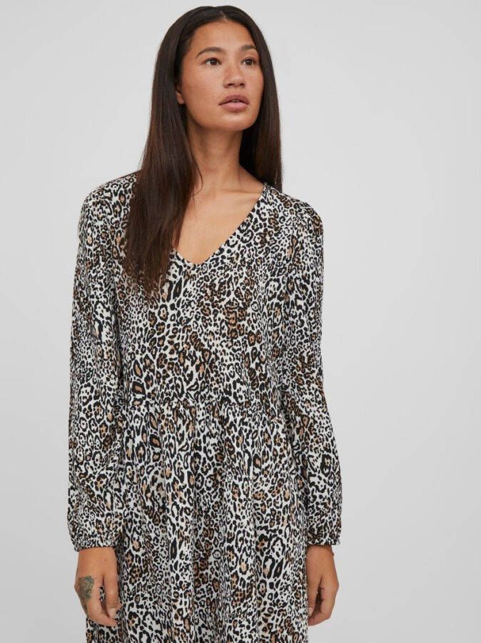 Vila Jurk met lange mouwen gedessineerd