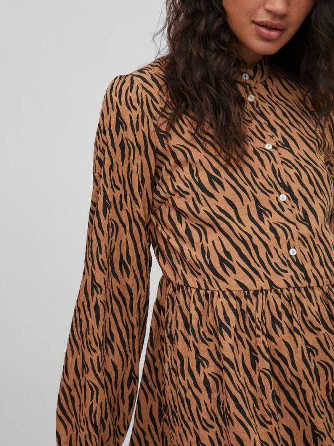 Vila Jurk met lange mouwen gedessineerd