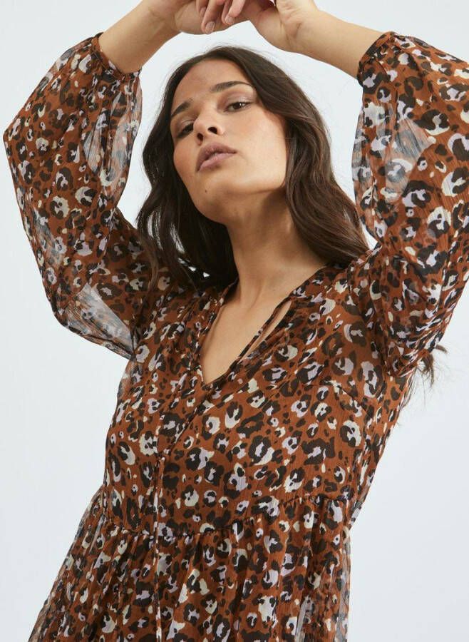 Vila Knielengte jurk gedessineerd